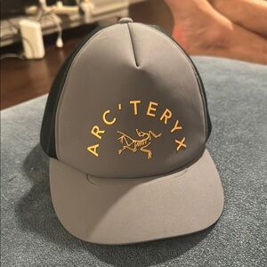 Arc'teryx Gray and Gold Logo Cap trucker hat